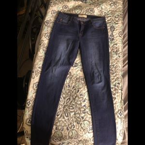 Theee pairs of jeans.